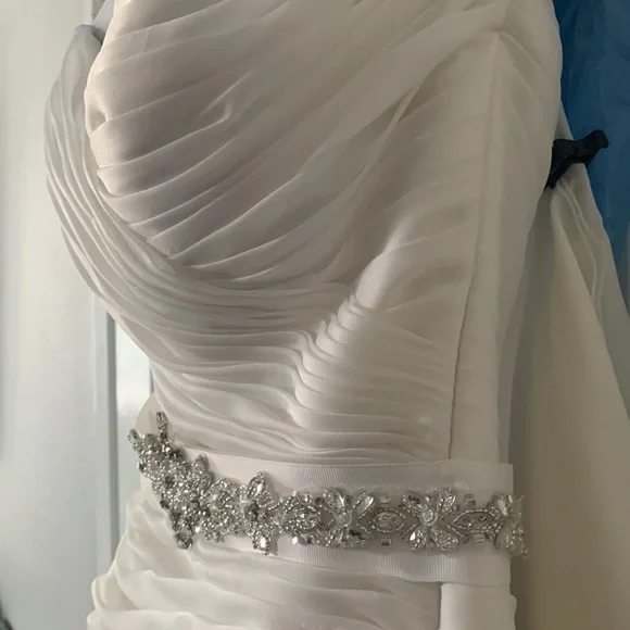 Beautiful off white Demtria cascading wedding dress.  Size 10, but altered. - Picture 4 of 12